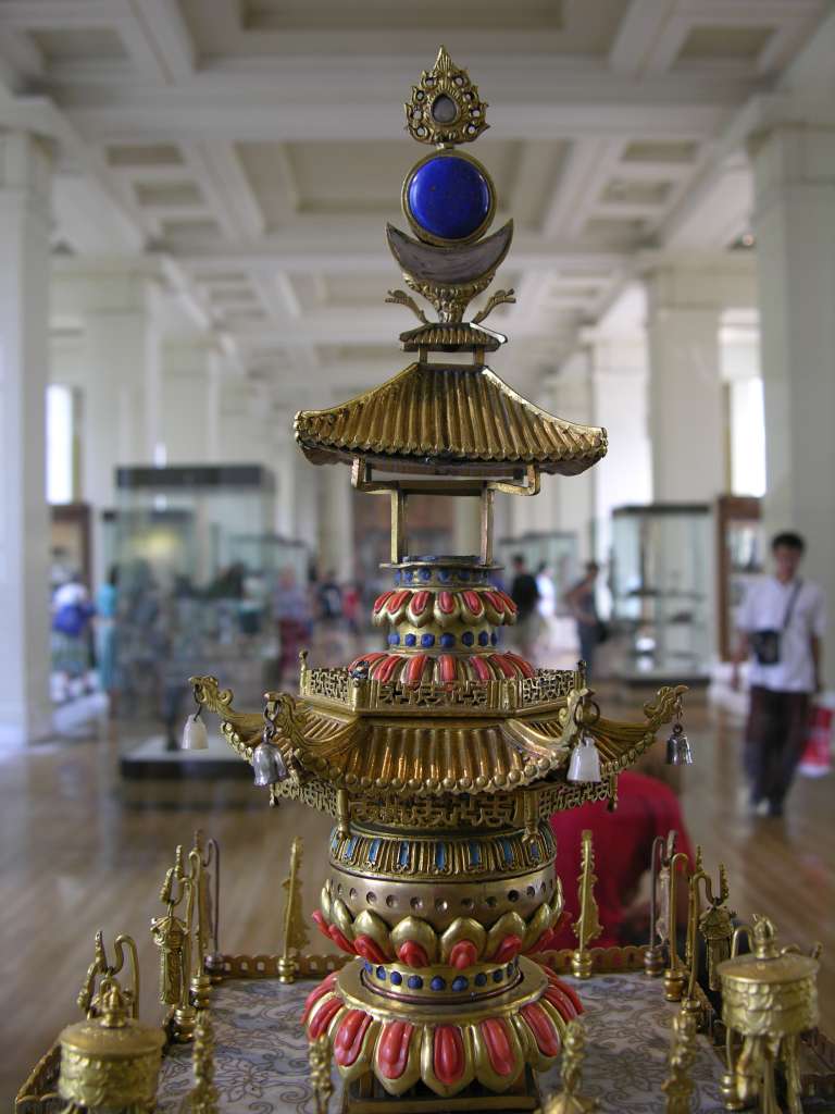 British Museum Top 20 Buddhism 10-1 Cloisonne Mandala Top 10. Cloisonne Mandala� China, 1772AD, 56cm high. This miniature building, inlaid with coral and bells made of jade and silver, represents a Buddhist mandala in three dimensions. Cloisonn� mandalas were popular under Emperor Qianlong (1736-95).